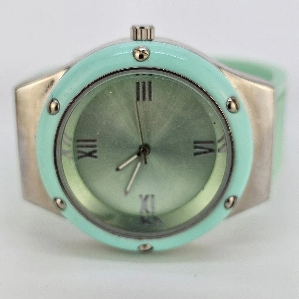 41MM Women's Watch Teal Bezel Multicolor Case Plastic Bands New Battery‎